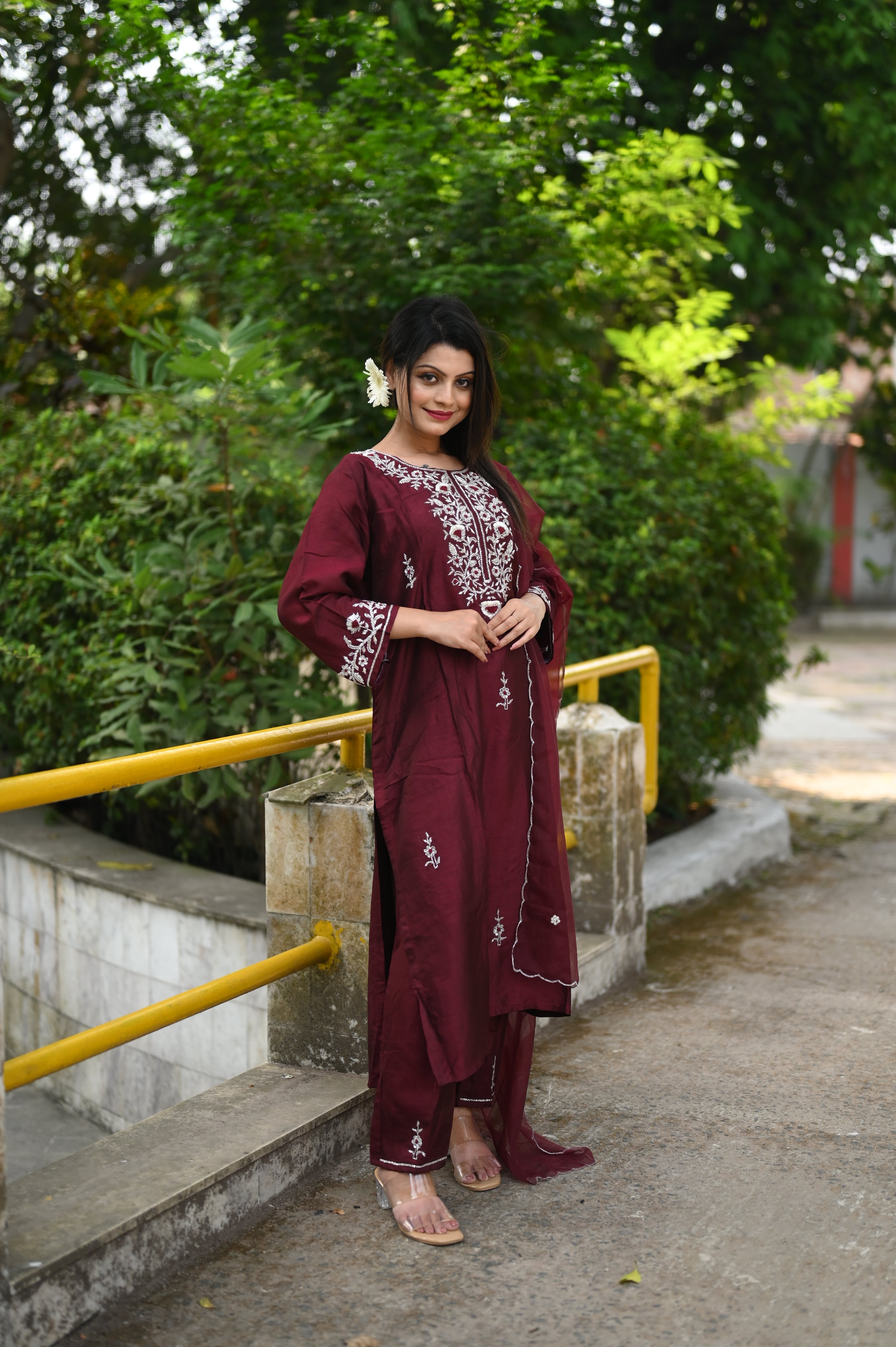 Maroon dola silk suit set featuring exquisite handwork