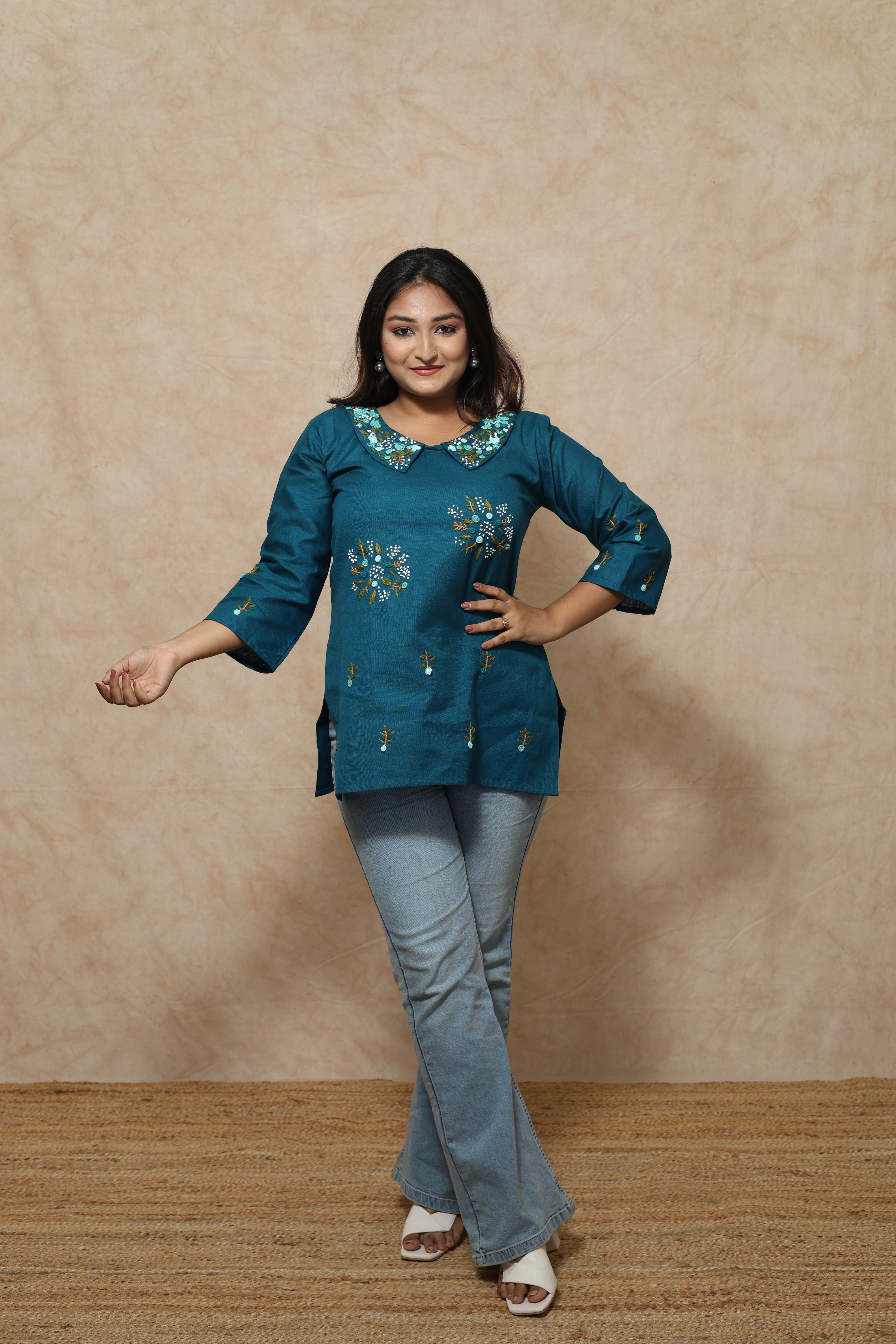 Turquoise blue cotton kurti with handcrafted details