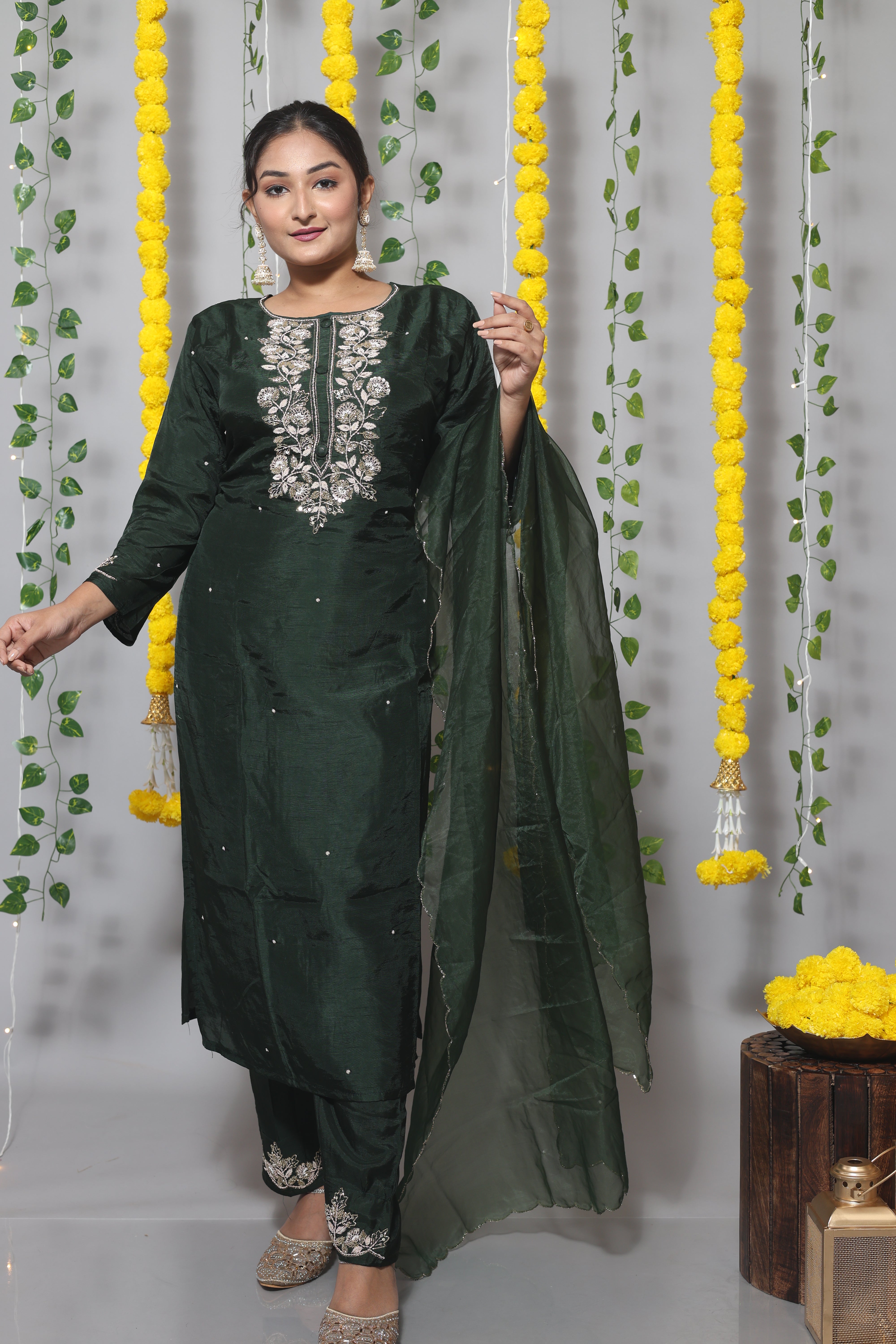 Bottle green dola silk suit set featuring exquisite handwork