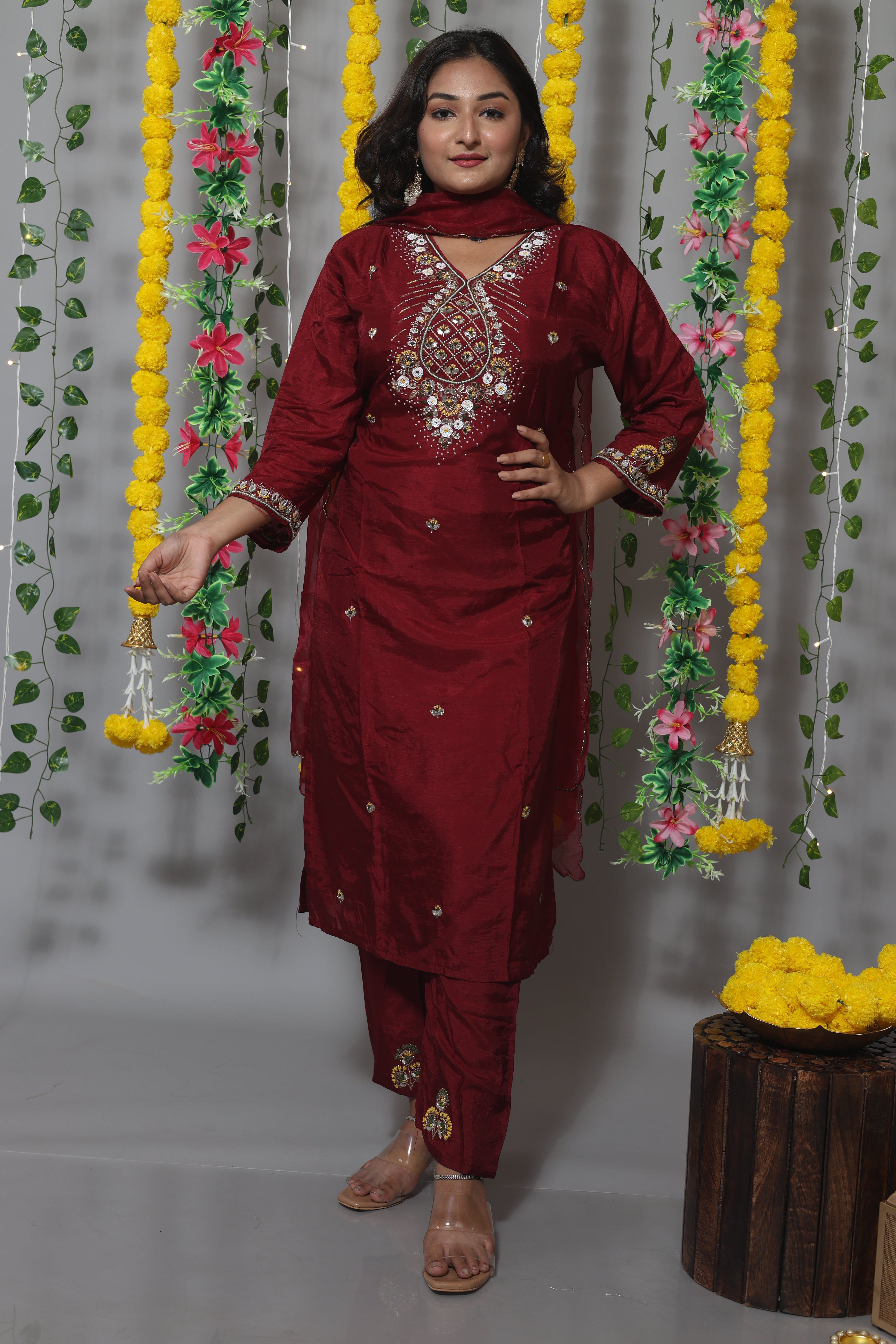Maroon color dola silk suit set featuring exquisite handwork