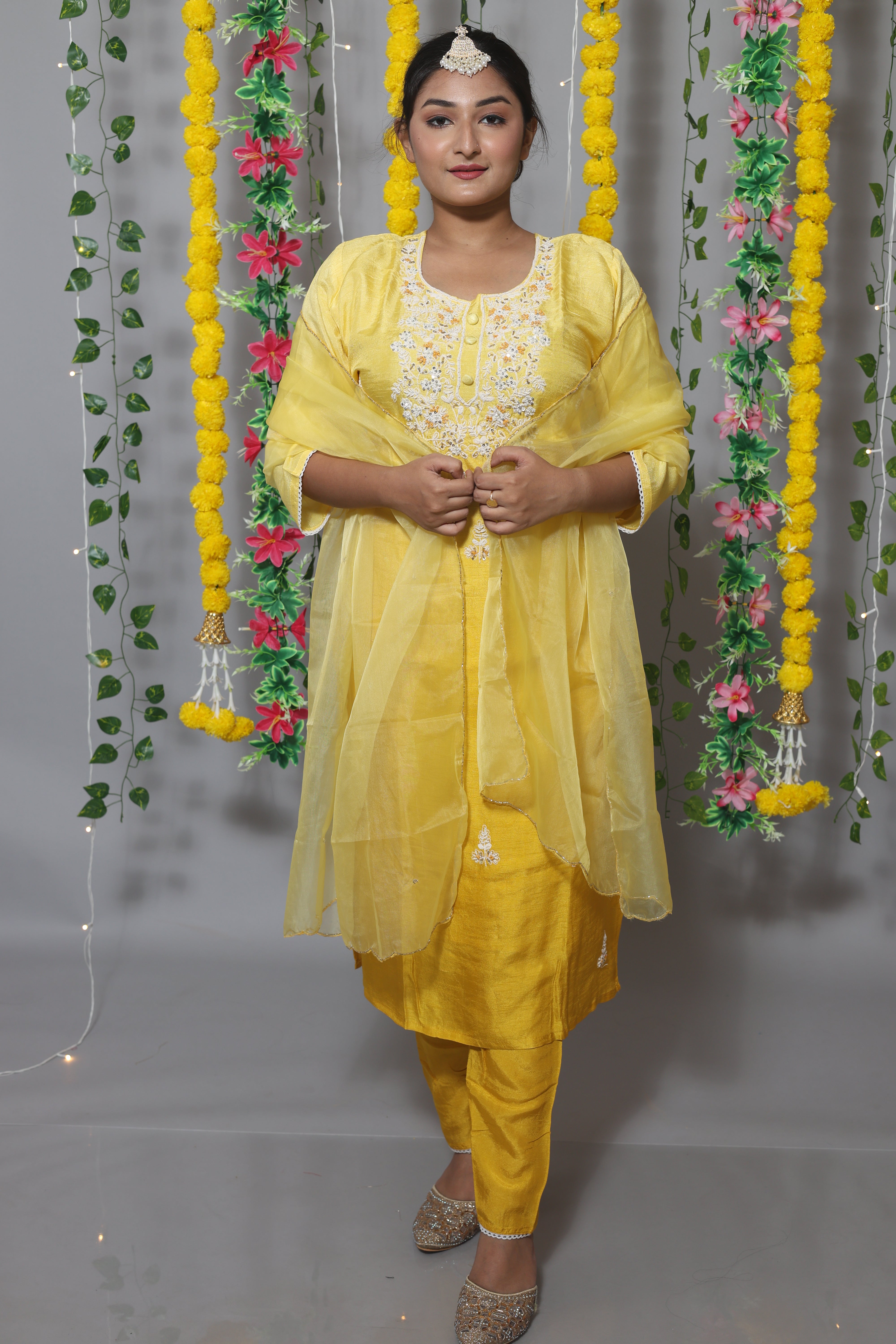 Yellow dola silk suit set featuring beautiful handwork
