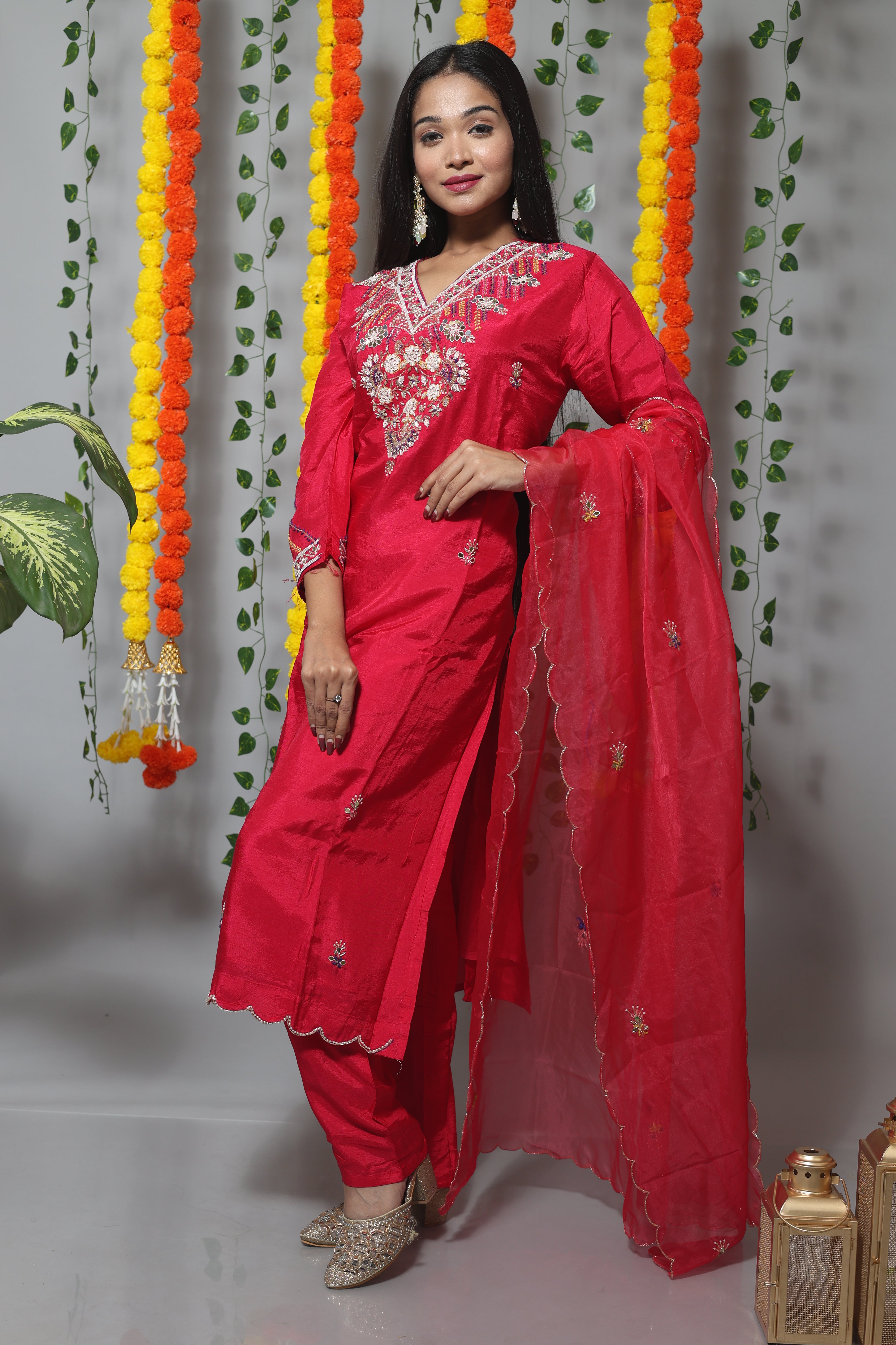 Cherry red dola silk suit set featuring intricate jardosi work