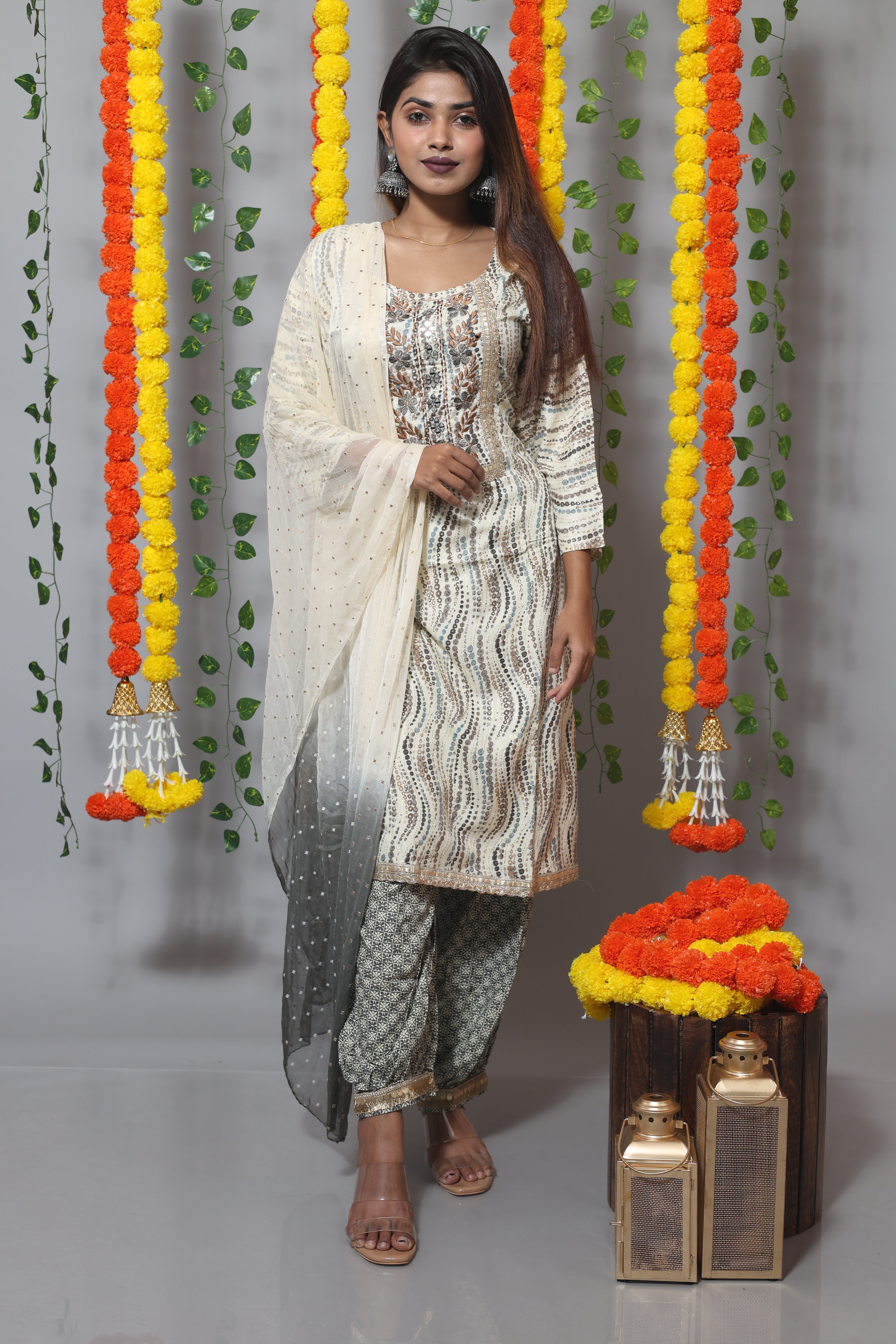 Off white Afghani suit set with intricate detailing