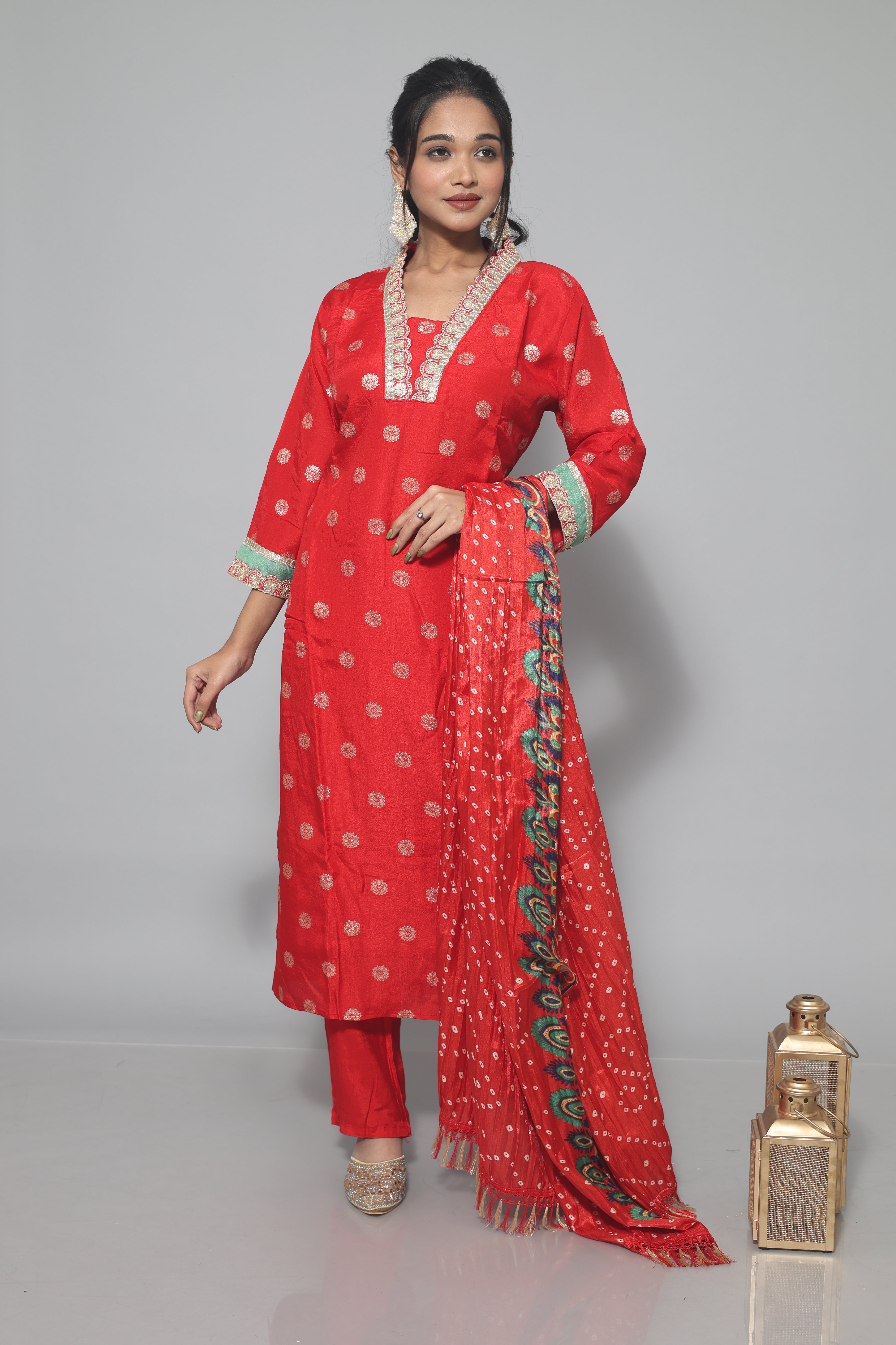 Red dola silk suit set featuring exquisite handwork