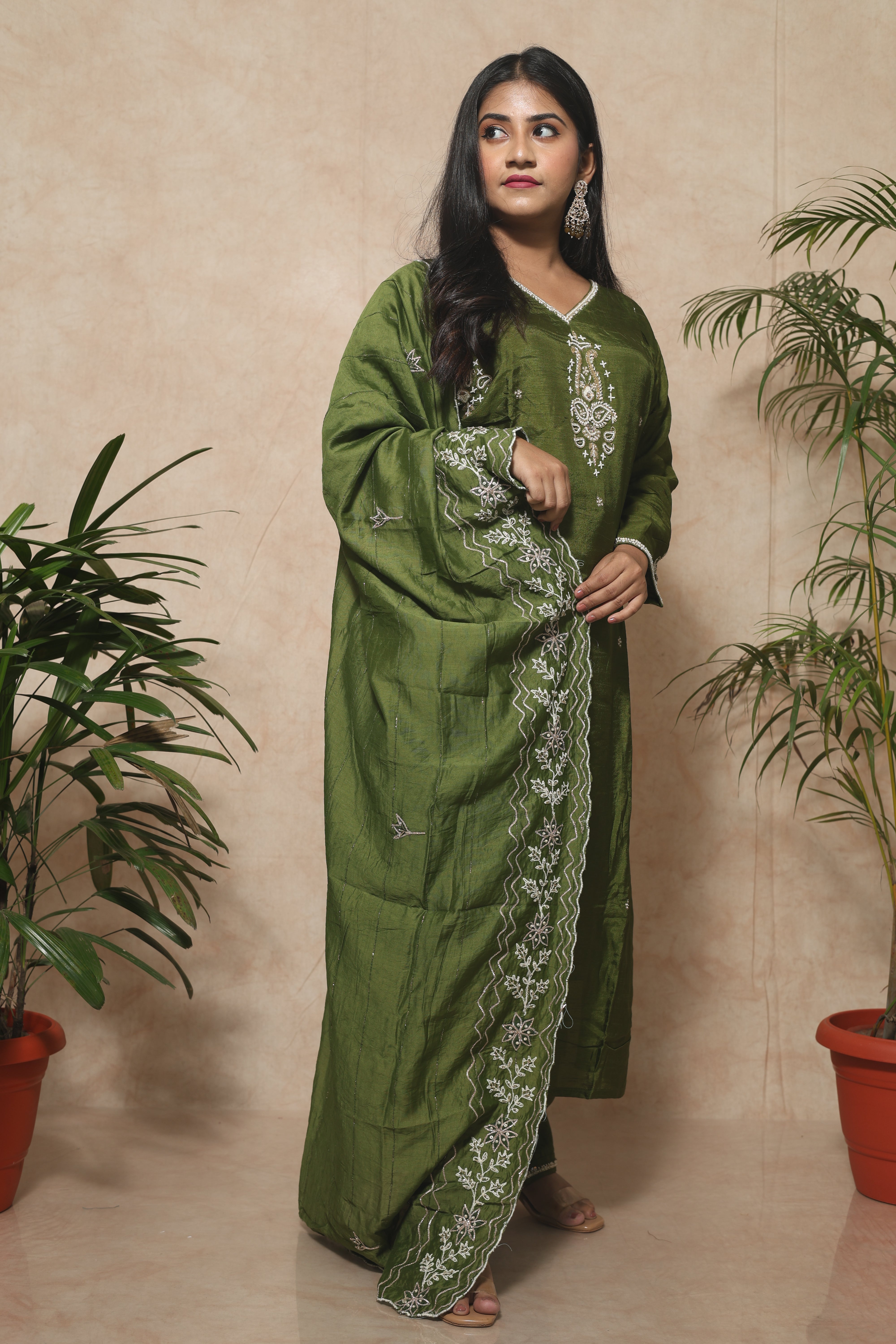 Olive green dola silk suit set with intricate handwork