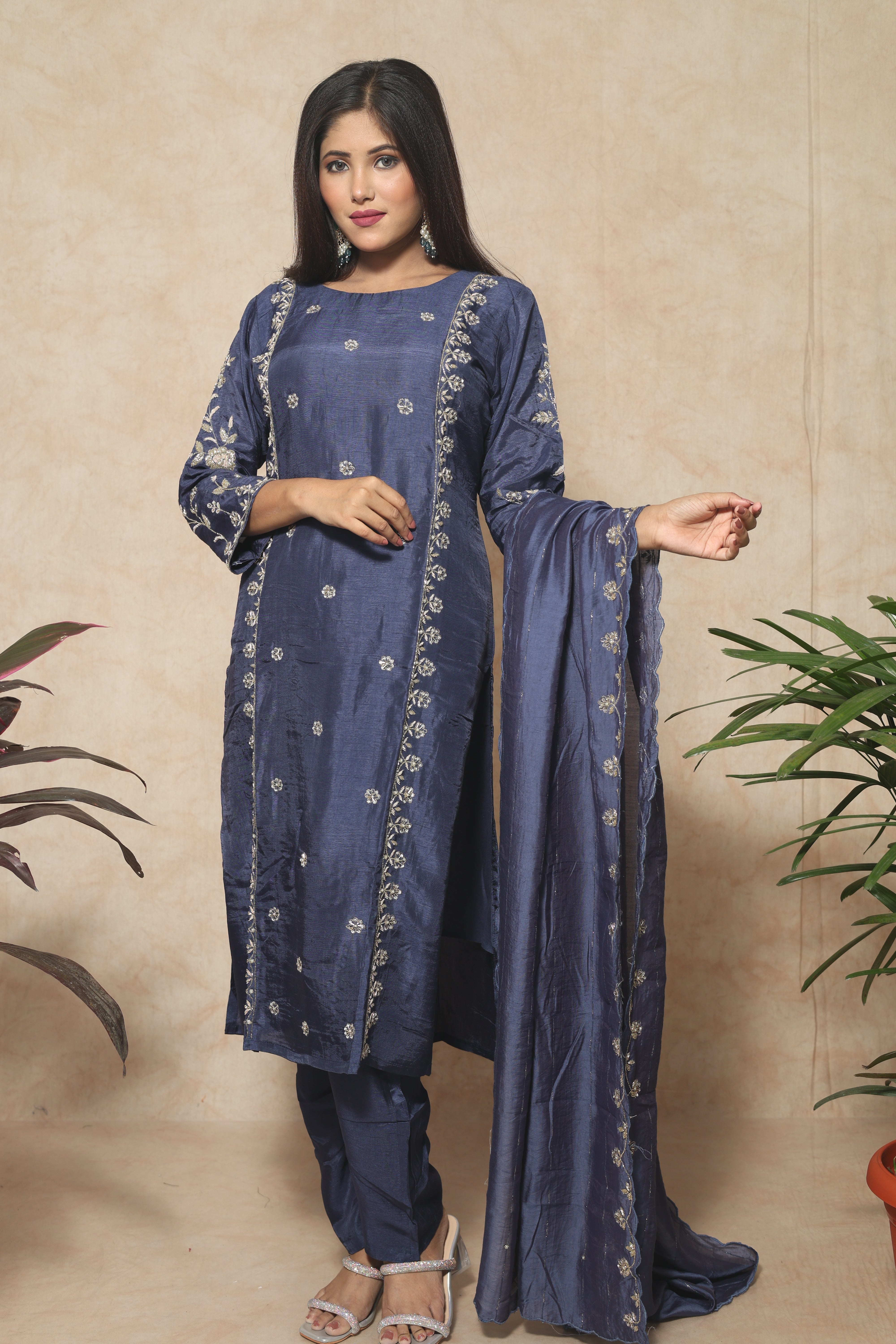 Blue color dola silk suit set featuring exquisite handwork
