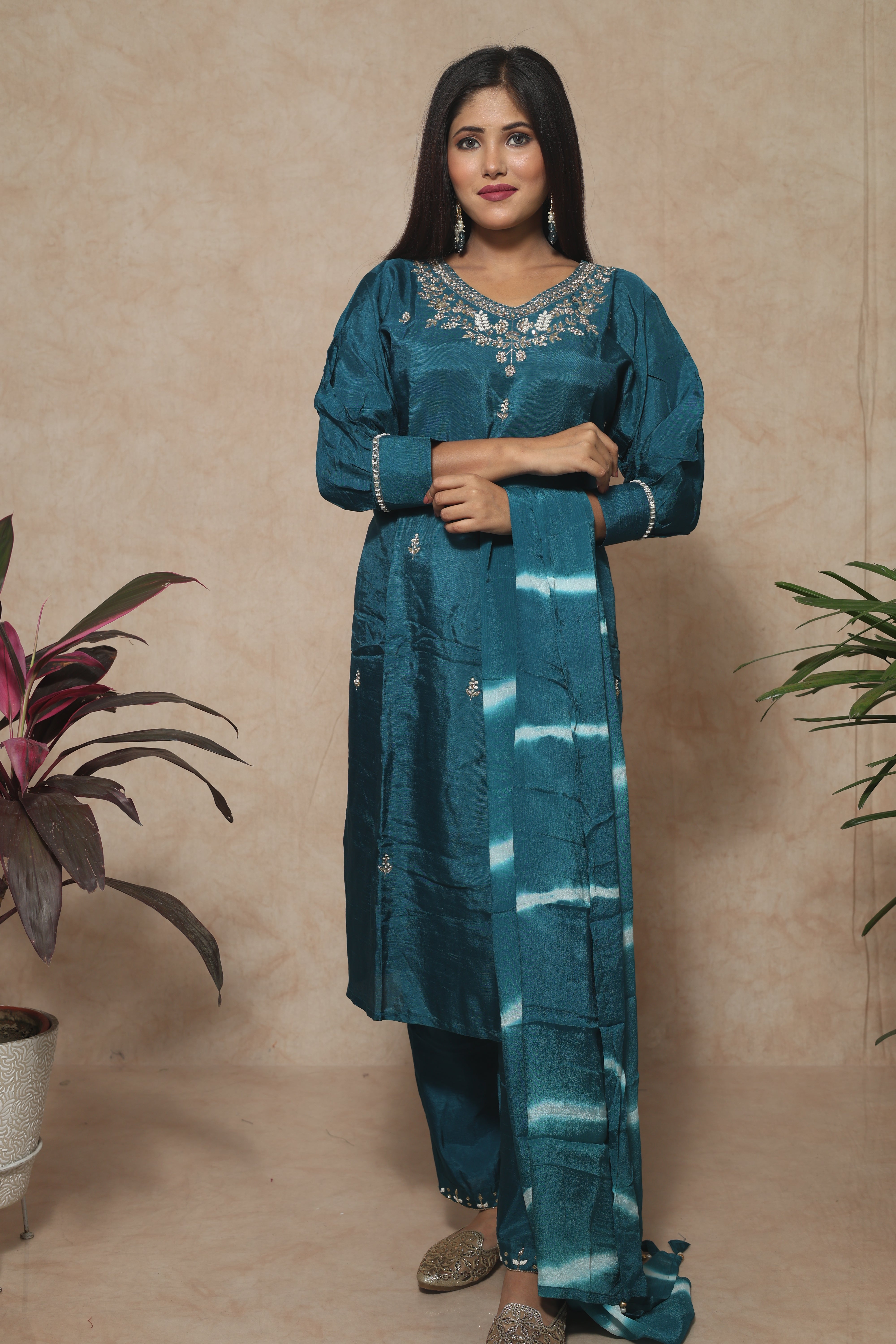 Blue color dola silk suit set featuring exquisite handwork