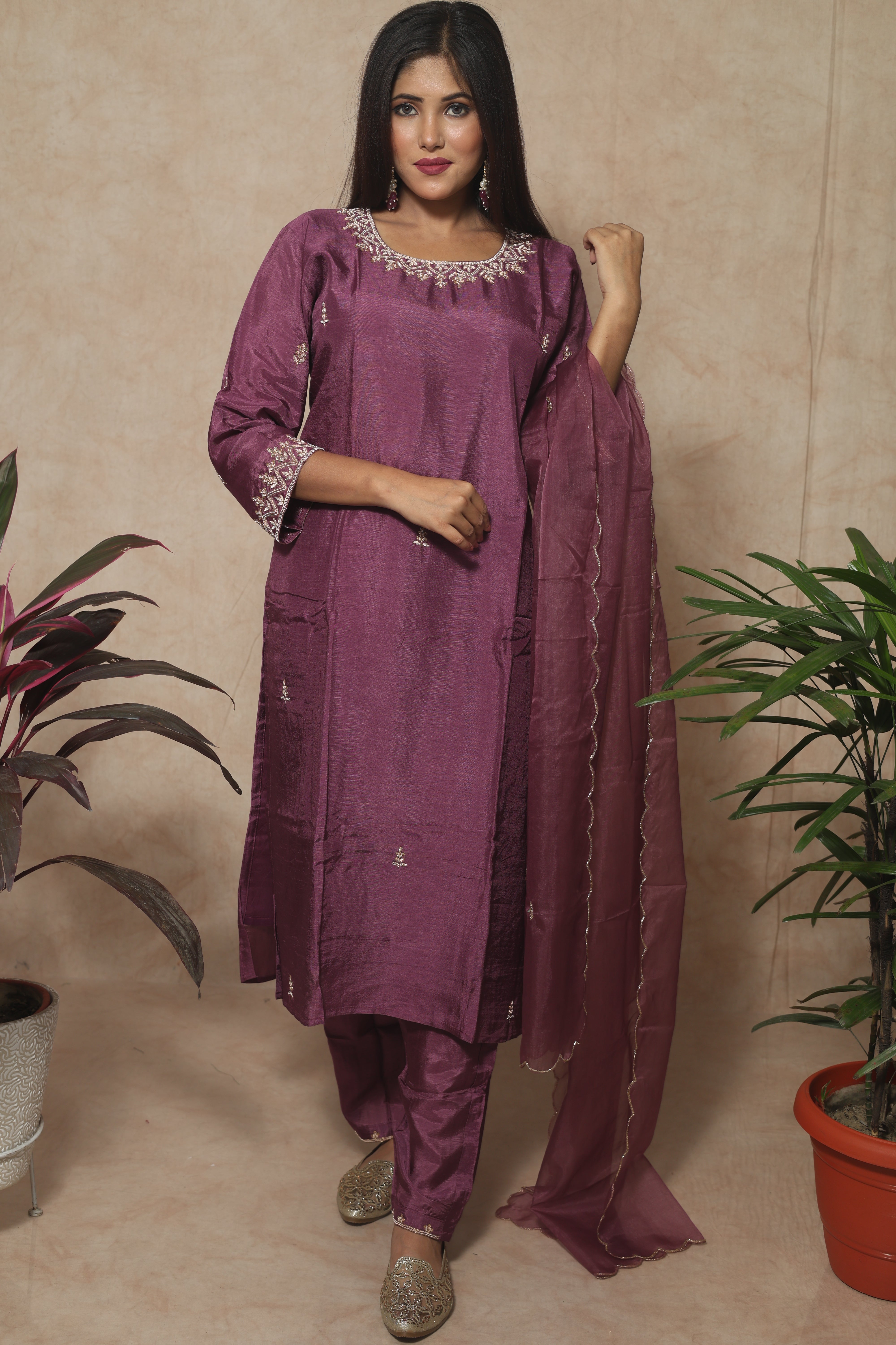 Plum color dola silk suit set with intricate handwork