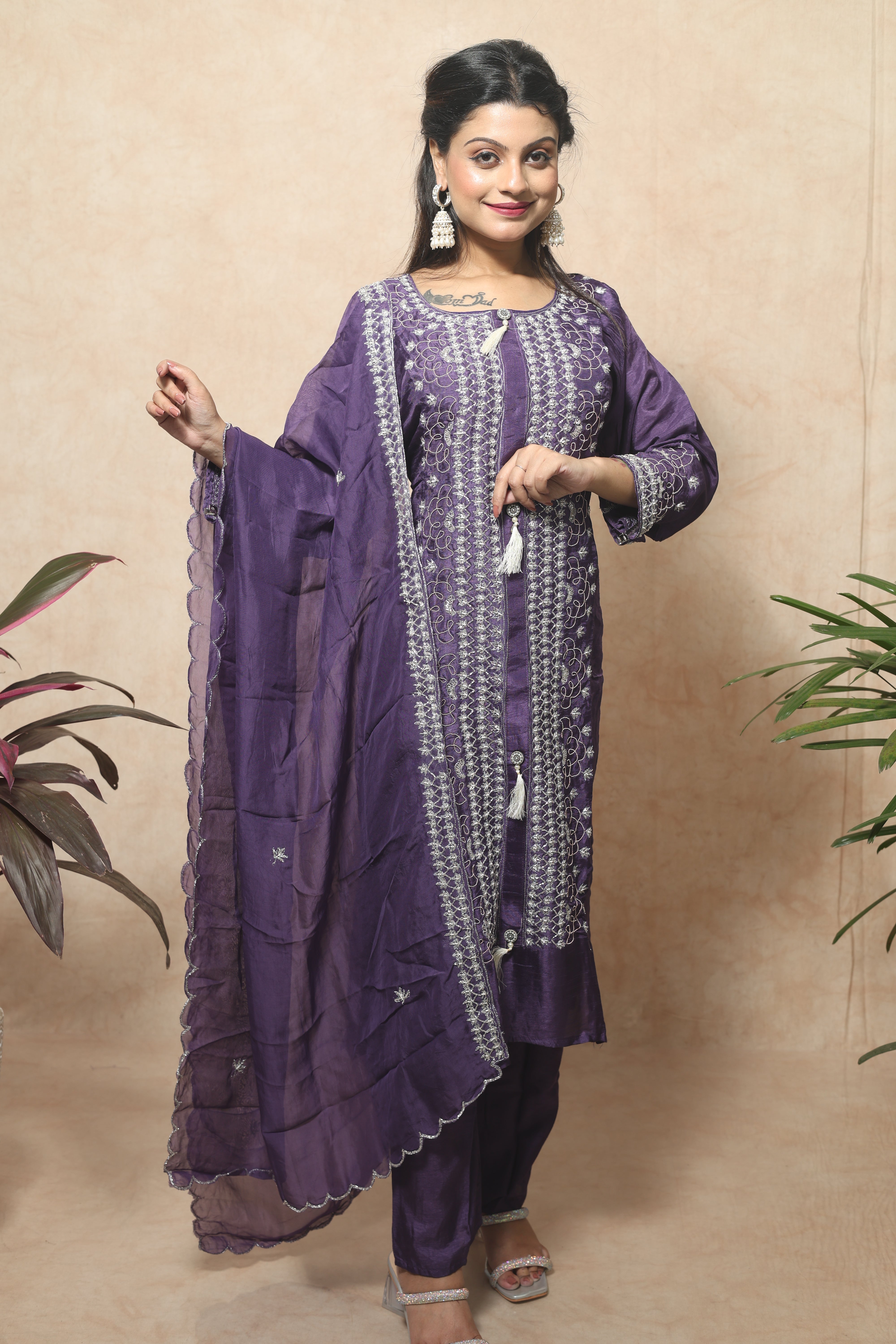 Purple color dola silk suit set featuring beautiful handwork