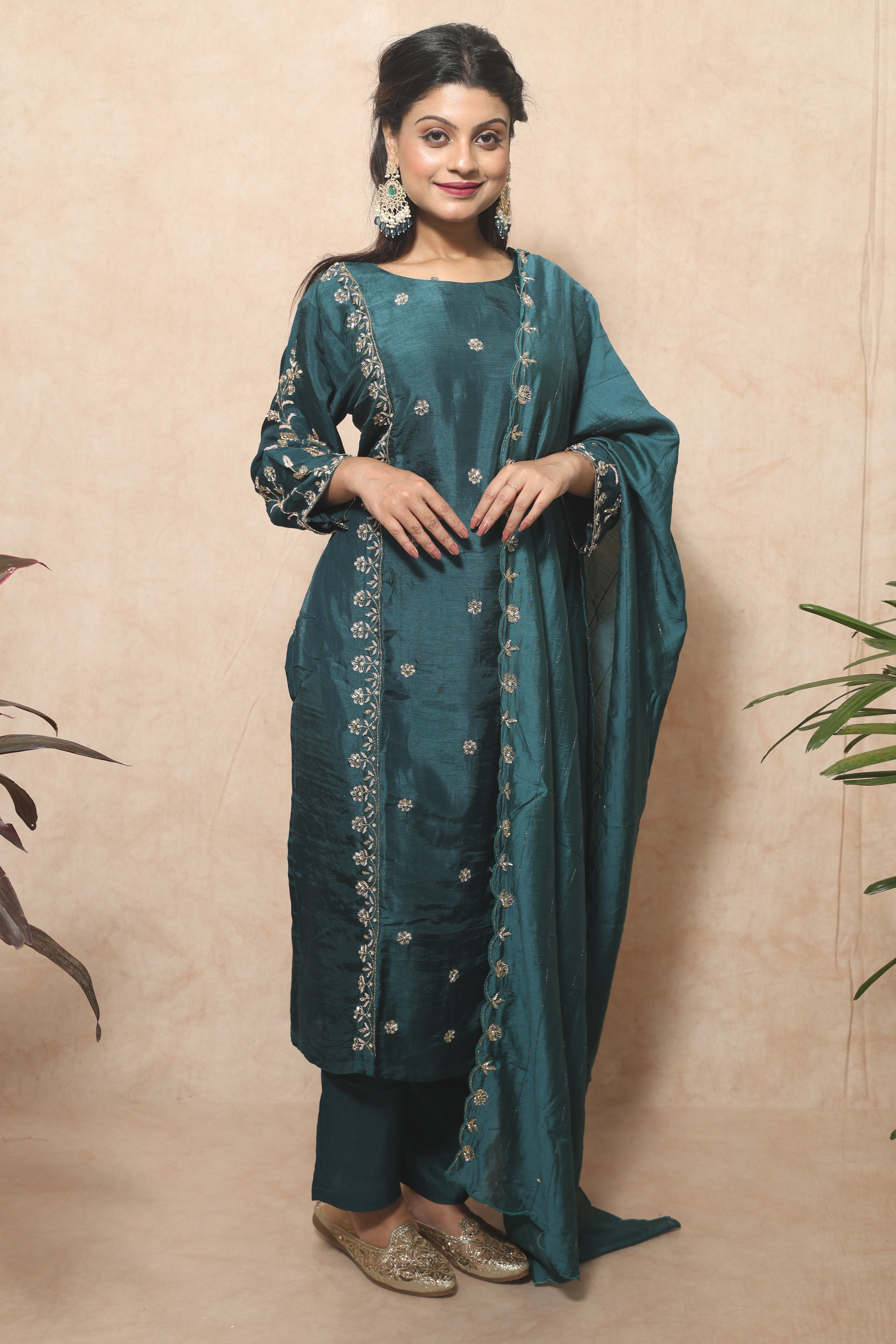 Peacock green color dola silk suit set featuring exquisite handwork