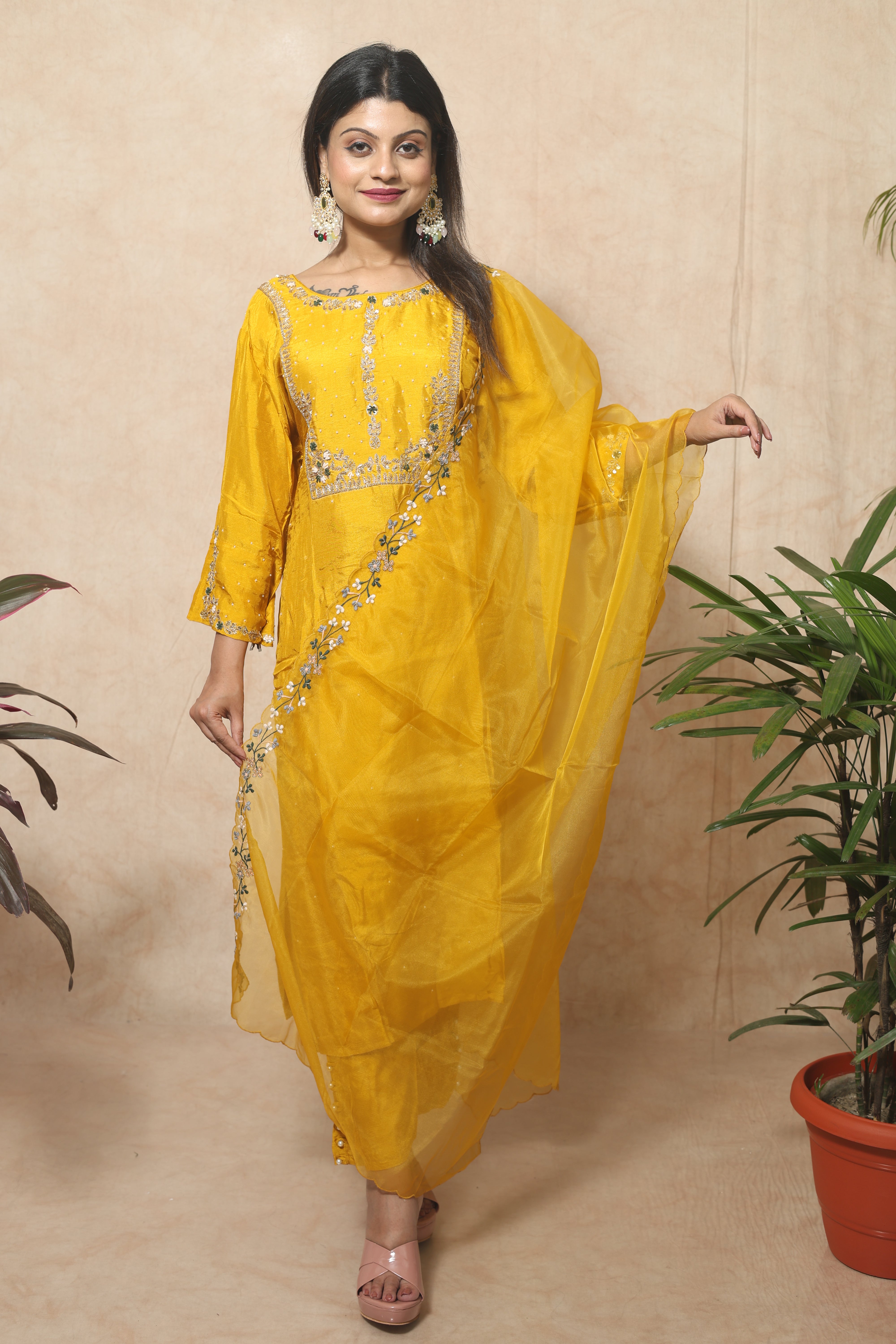 Yellow dola silk suit set featuring exquisite hand embroidery