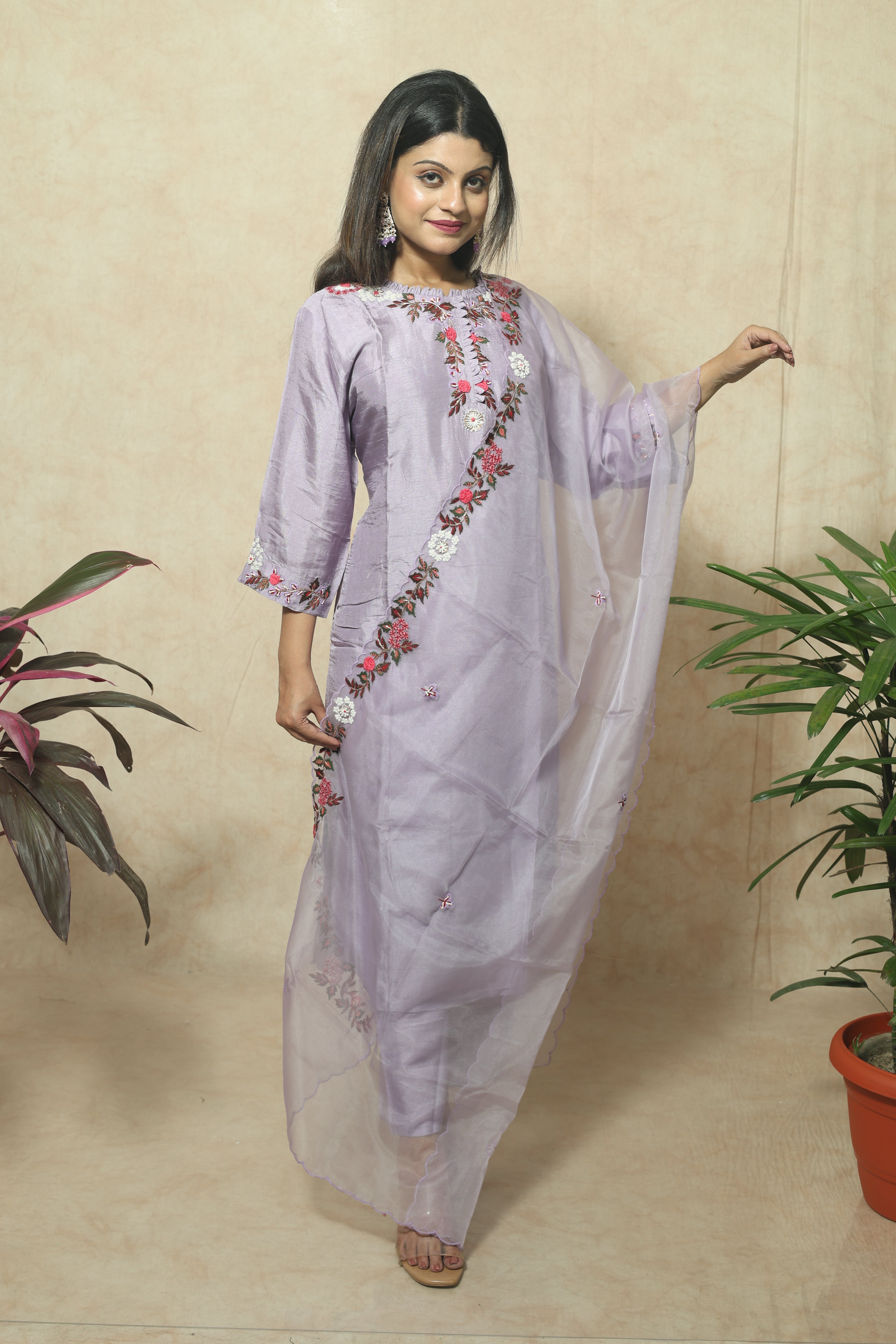 Lavender color dola silk suit set featuring beautiful hand embroidery