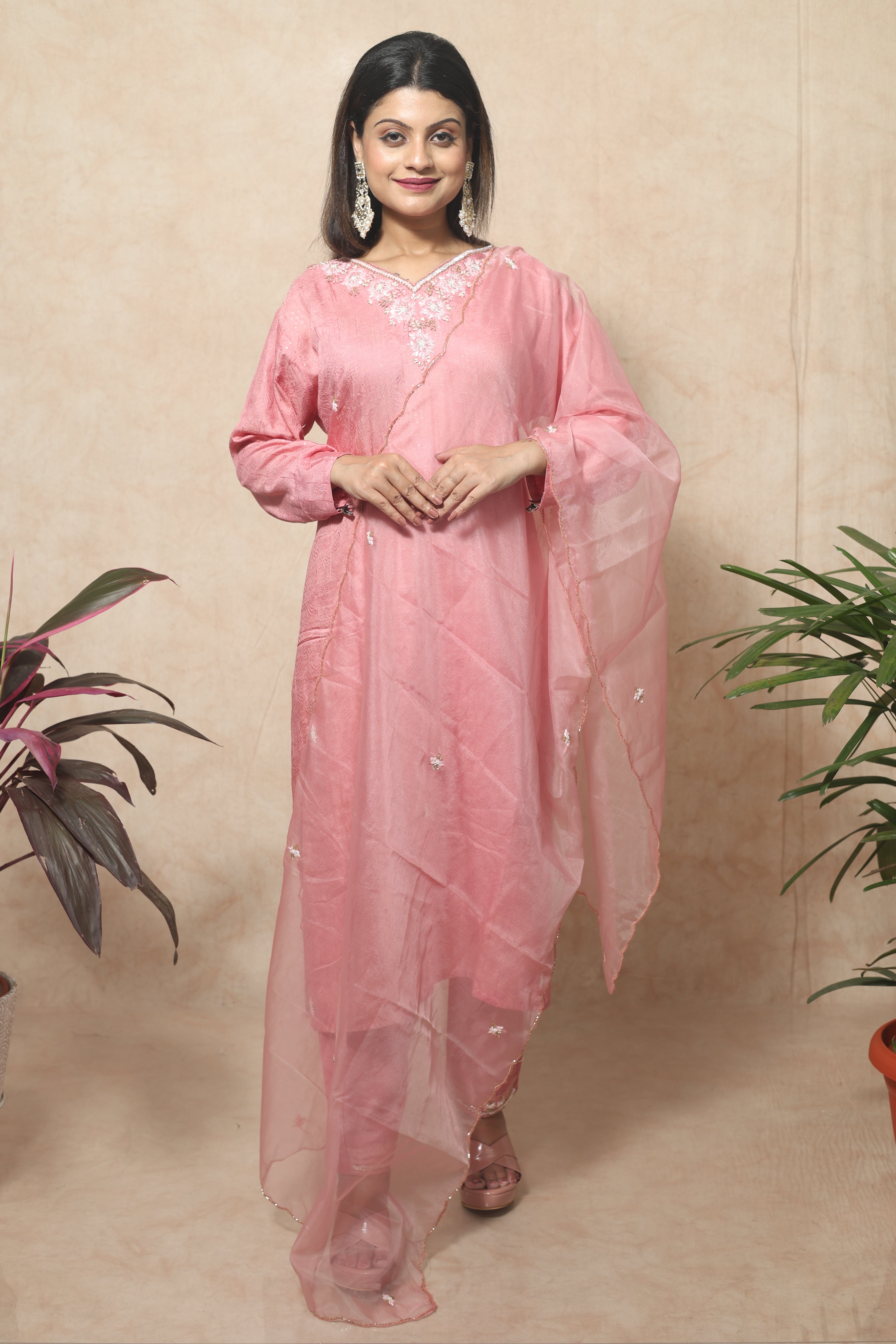Nude pink color dola silk suit set featuring exquisite hand embroidery