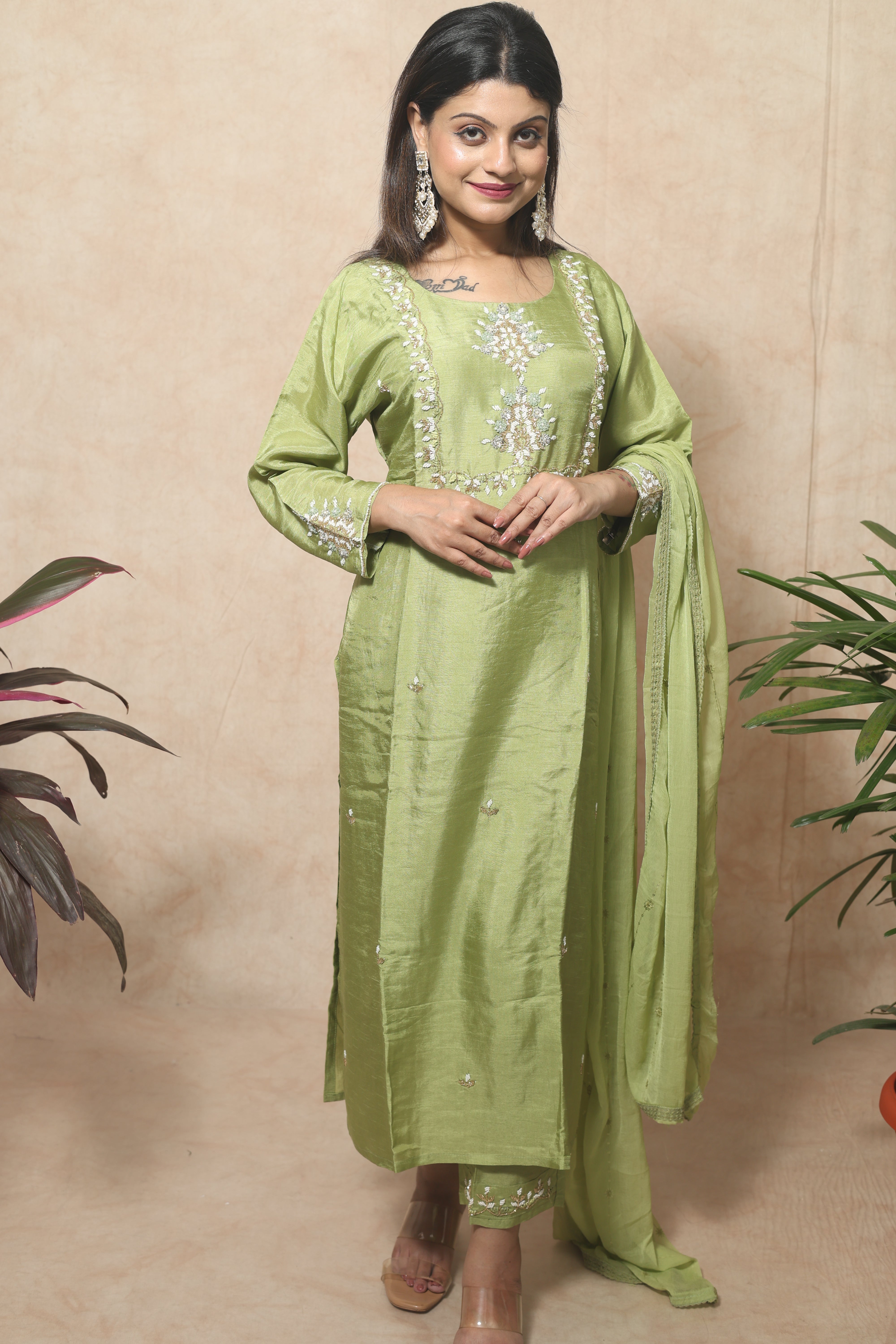 Pista green color dola silk suit set featuring exquisite handcrafted details