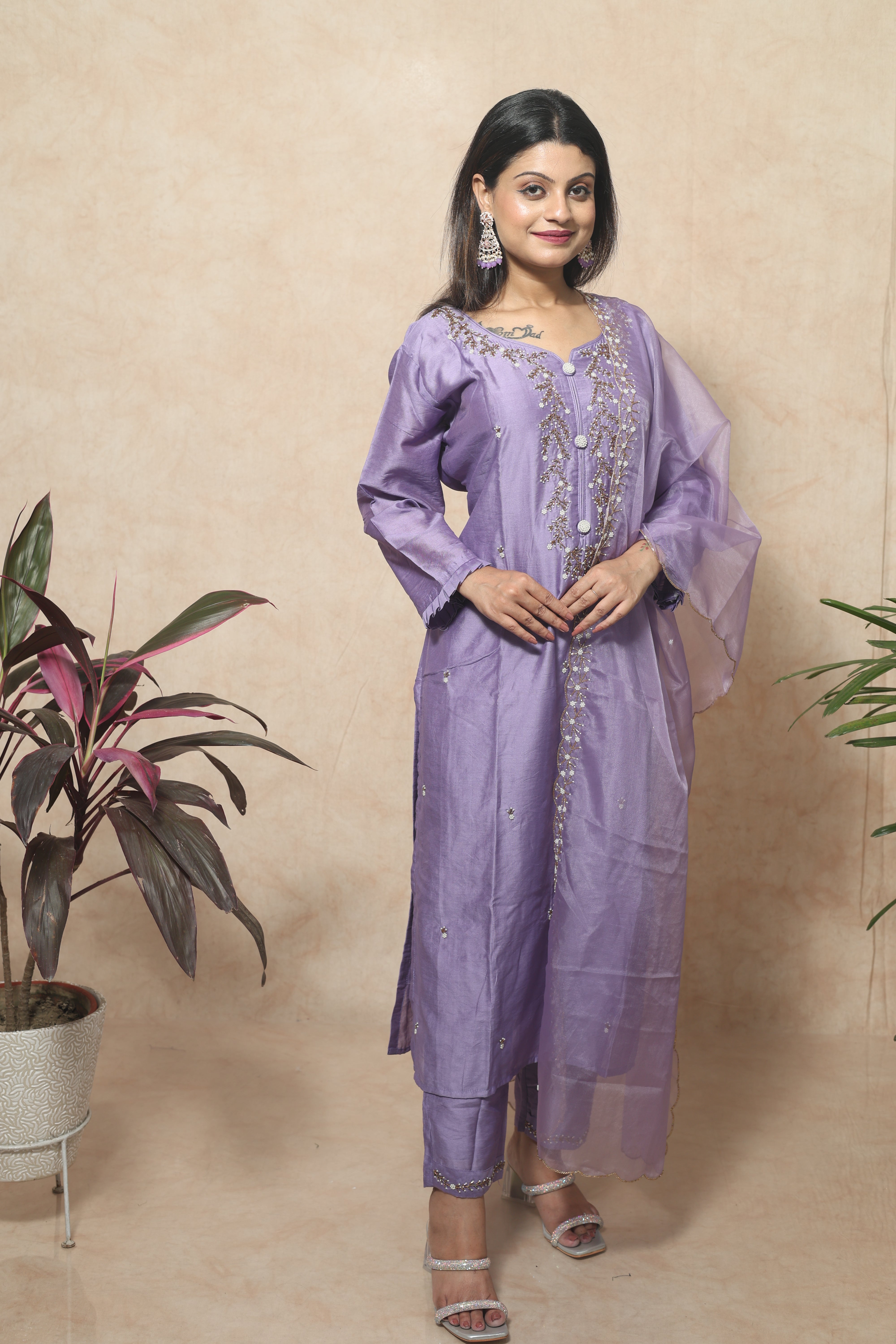 Lavender color dola silk suit set featuring beautiful hand embroidery