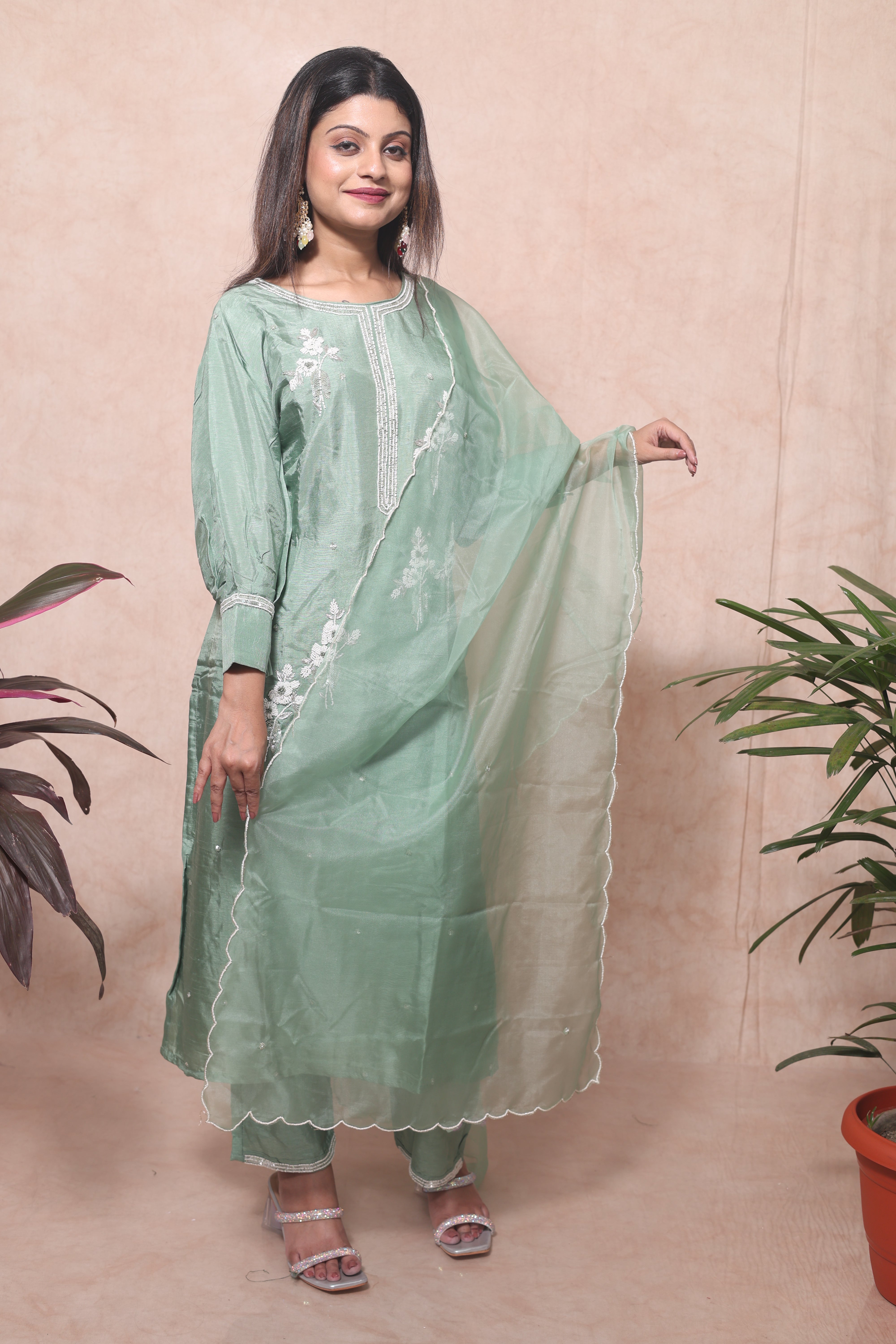Pastel green dola silk suit with handwork, ideal for women's wear